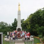 group in front of Monument